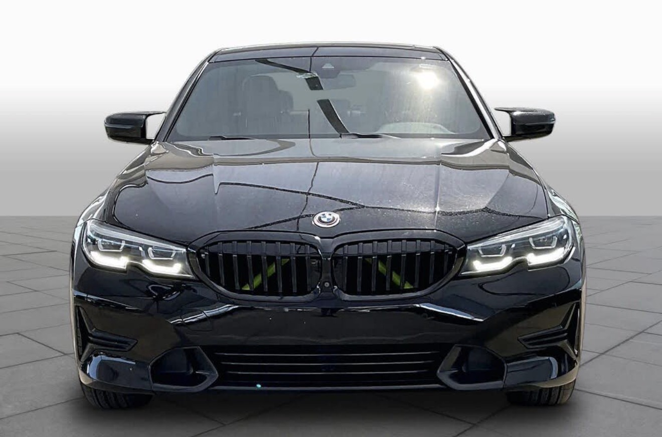 Black BMW 3 Series front view