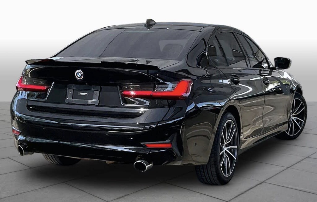 Black BMW 3 Series rear view
